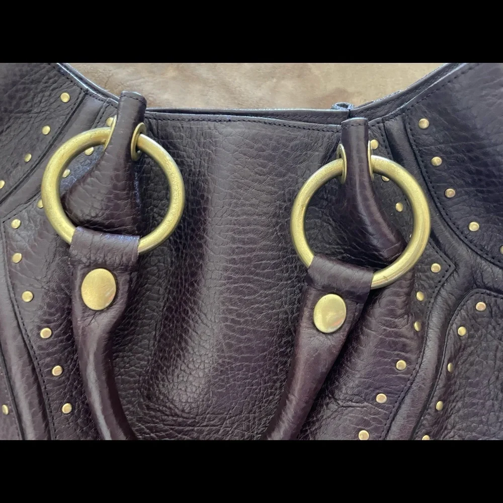 Kenneth Cole Purple Thick
Pebble Leather Studs Satchel Handbag
Purse PRE-OWNED - Picture 7 of 11